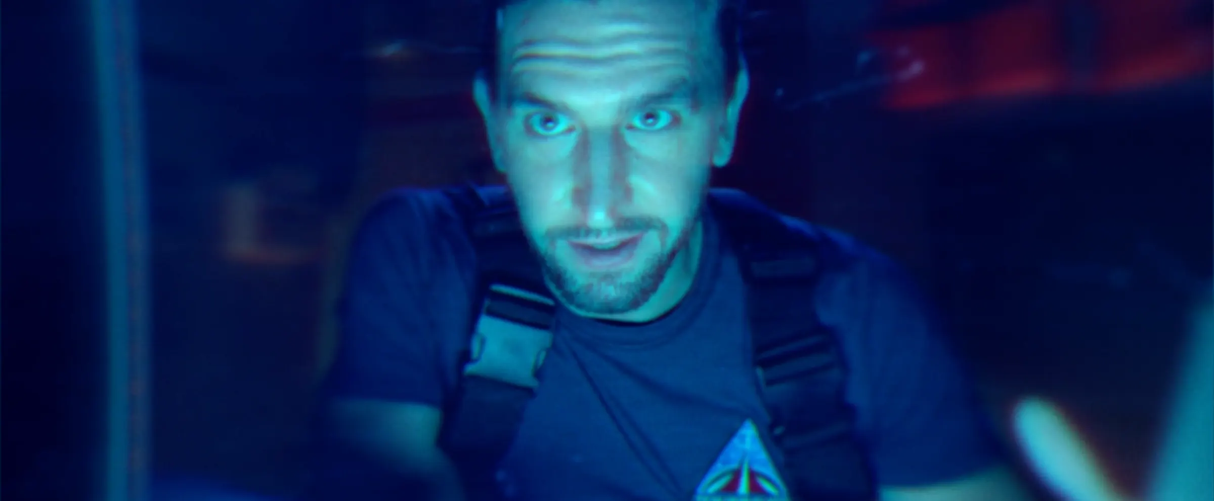 A crewmate on a monitor inside the ship.